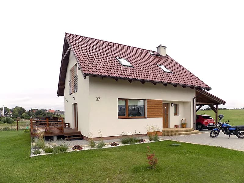 Jakie elewacje pasują do czerwonego dachu? Odkryj idealne kolory